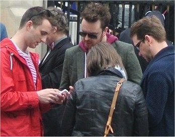 Treasure Hunters using phone for hunting with Treasure Hunts in London