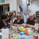 Discussing the clues at A Taste Of Murder - photo by Juliamaud