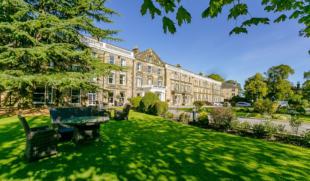 "front of the hotel with garden al fresco seating" Photo provided by management (Nov 2019)