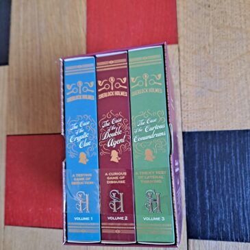 Sherlock Holmes The Challenge Trilogy books inside a presentation box