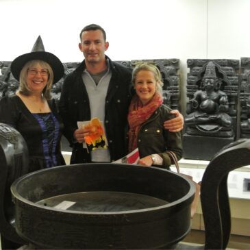 A witch with a couple of treasure hunters at the british museum - witch, man, woman, cauldron